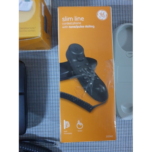 644D - 'Gigaset' Corded Analog Telephone, Together With A 'General Electric' Slim Corded Telephone. (2)