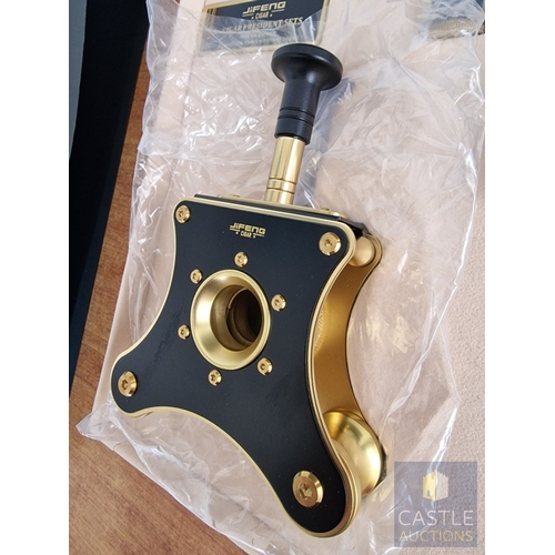 54 - JiFENG 'Cigar Presidents Sets'; An Impressive Cigar Accessory Gift Set Comprising Brass Colour Metal... 