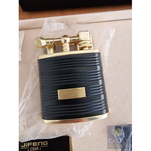 54 - JiFENG 'Cigar Presidents Sets'; An Impressive Cigar Accessory Gift Set Comprising Brass Colour Metal... 