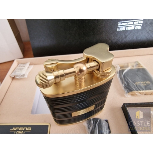 54 - JiFENG 'Cigar Presidents Sets'; An Impressive Cigar Accessory Gift Set Comprising Brass Colour Metal... 