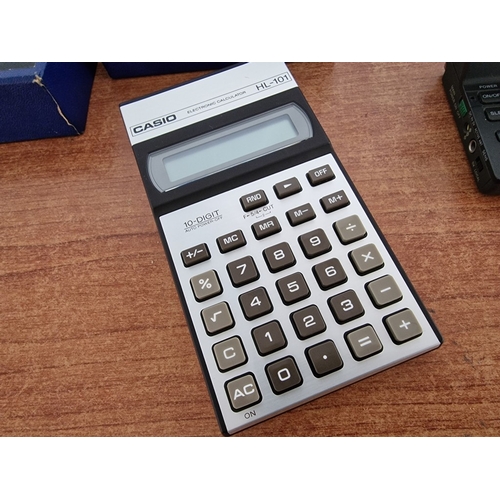 709F - SONY Worldband Receiver (ICF-SW100E), Both in Original Boxes, Together with 'Calculator Bug System Z... 