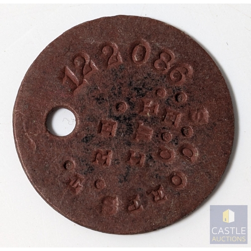 262 - WW2 British Fibre Identity Disc (“Dog Tag”), impressed “V/22886 H.F. WOOD C of E …”.

Standard issue... 