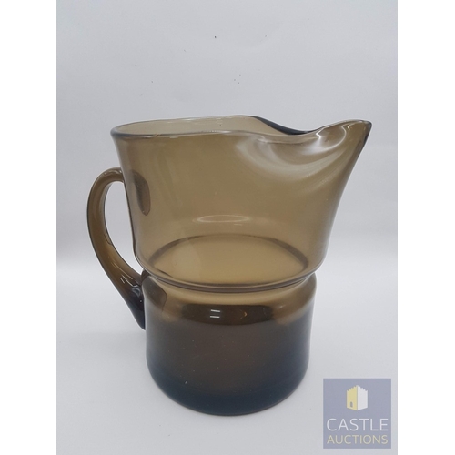 348 - 2 x Different Shape and Color Glass Water Jugs; Retro- Green Glass (Approx. H: 15.5cm) and Modern in... 