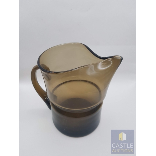 348 - 2 x Different Shape and Color Glass Water Jugs; Retro- Green Glass (Approx. H: 15.5cm) and Modern in... 