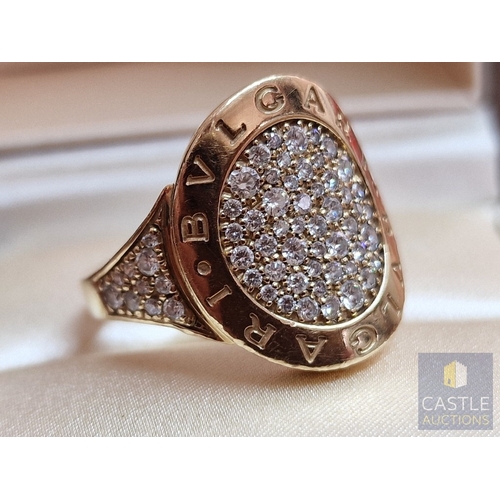 19 - Stunning BVLGARI 18ct Gold & Pave Set Diamond Ring; The Central Curved Oval Shape Motif is Pave Set ... 