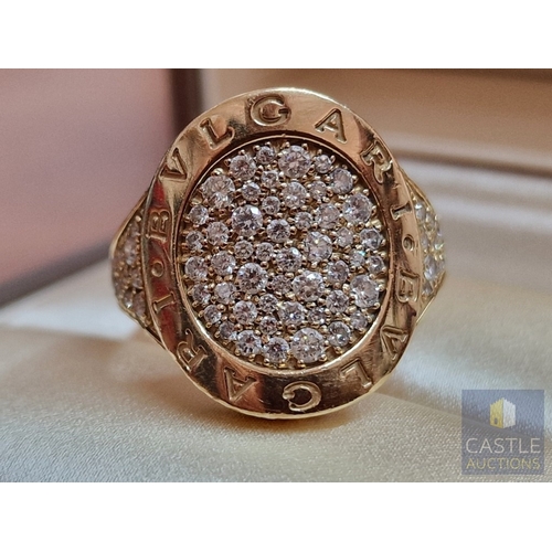 19 - Stunning BVLGARI 18ct Gold & Pave Set Diamond Ring; The Central Curved Oval Shape Motif is Pave Set ... 