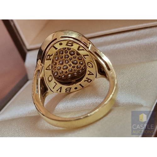 19 - Stunning BVLGARI 18ct Gold & Pave Set Diamond Ring; The Central Curved Oval Shape Motif is Pave Set ... 
