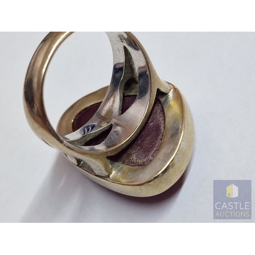 17 - Striking Heavy 18ct Gold Statement Ring with a Large Polished Red Hardstone Cabochon (Ruby?) of Scul... 