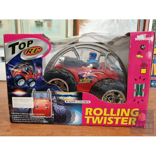 39 - 'Universal' US Aircraft Carrier Toy / Model, Together with 'Top R/C' Rolling Twister Radio Controlle... 