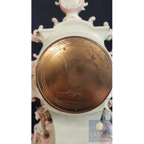 1 - A Decorative Continental Porcelain Mantel Clock, Richly Modelled with Applied Flowers, Scrollwork an... 