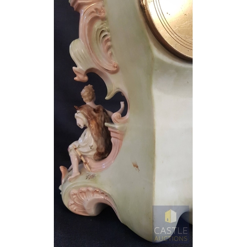 1 - A Decorative Continental Porcelain Mantel Clock, Richly Modelled with Applied Flowers, Scrollwork an... 