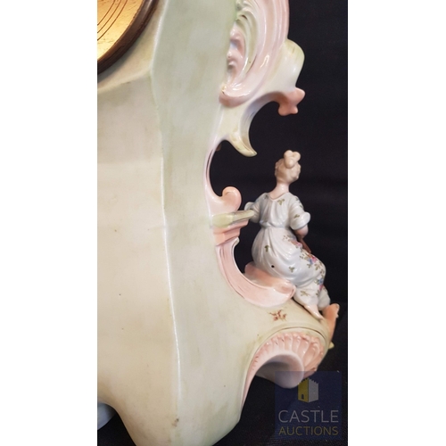 1 - A Decorative Continental Porcelain Mantel Clock, Richly Modelled with Applied Flowers, Scrollwork an... 
