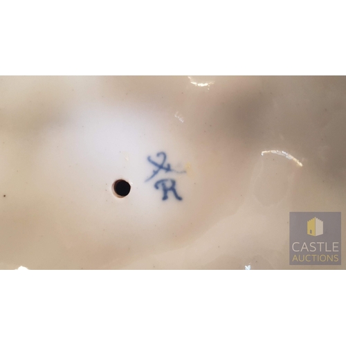 2 - Continental Porcelain Opposing Pair of Figural Candle Holders of Cherubs / Putti with Floral Decorat... 