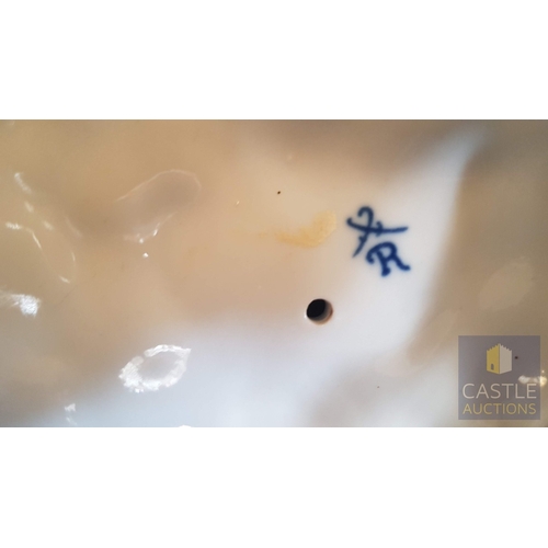 2 - Continental Porcelain Opposing Pair of Figural Candle Holders of Cherubs / Putti with Floral Decorat... 