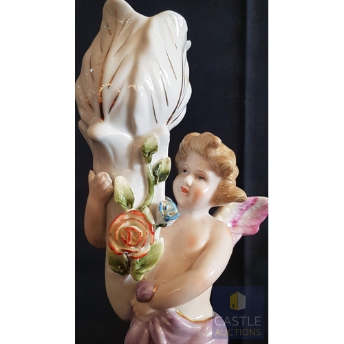 2 - Continental Porcelain Opposing Pair of Figural Candle Holders of Cherubs / Putti with Floral Decorat... 