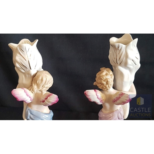 2 - Continental Porcelain Opposing Pair of Figural Candle Holders of Cherubs / Putti with Floral Decorat... 