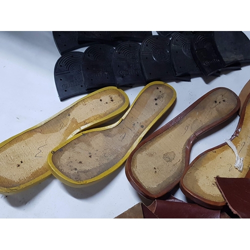 676E - Master Shoemaker's Vintage Accessories; Pieces of Leather, Ready-Made Sole Molds, Shoe Paints in an ... 