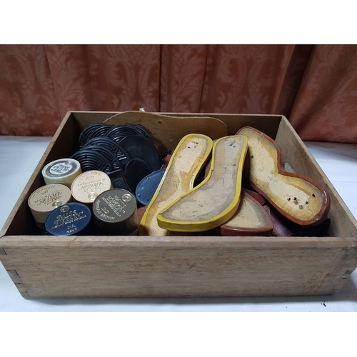 676E - Master Shoemaker's Vintage Accessories; Pieces of Leather, Ready-Made Sole Molds, Shoe Paints in an ... 