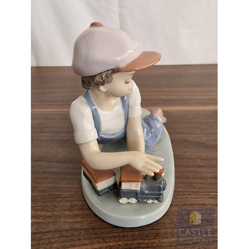 204 - Lladro Porcelain Figurine 'All Aboard' (#7619), of Boy with Train, 1992 Lladro Collector's Society P... 