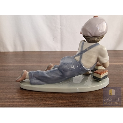 204 - Lladro Porcelain Figurine 'All Aboard' (#7619), of Boy with Train, 1992 Lladro Collector's Society P... 