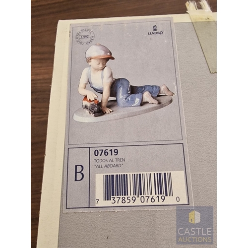 204 - Lladro Porcelain Figurine 'All Aboard' (#7619), of Boy with Train, 1992 Lladro Collector's Society P... 
