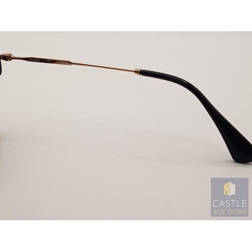 173A - MIU MIU Rasoir 12QS Sunglasses, Black/Grey Lenses, Black Frame and Gold -Tone Metal Nose Bridge and ... 