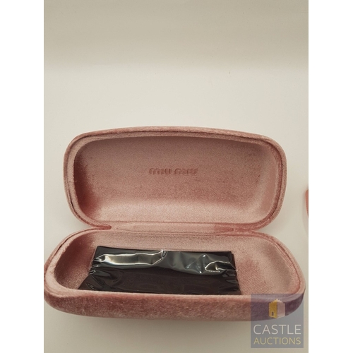 173A - MIU MIU Rasoir 12QS Sunglasses, Black/Grey Lenses, Black Frame and Gold -Tone Metal Nose Bridge and ... 