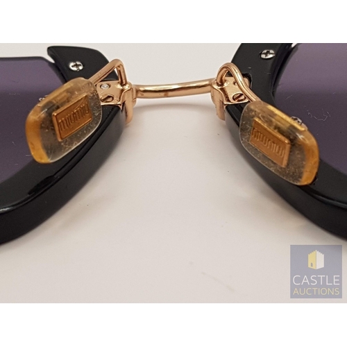173A - MIU MIU Rasoir 12QS Sunglasses, Black/Grey Lenses, Black Frame and Gold -Tone Metal Nose Bridge and ... 