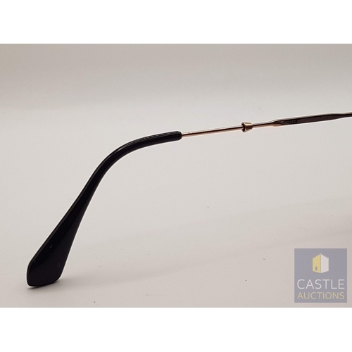 173A - MIU MIU Rasoir 12QS Sunglasses, Black/Grey Lenses, Black Frame and Gold -Tone Metal Nose Bridge and ... 