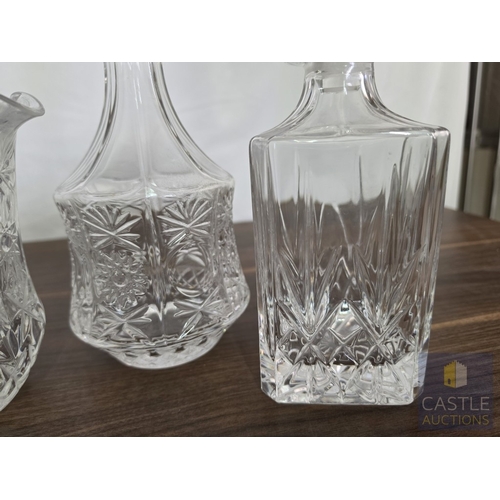 596M - Collection of Crystal Tableware; 2 x Decanters, Water Jug, and Pair of Glasses, (5), Noted couple sm... 