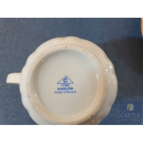 702H - Incomplete Polish (Chmielow) Porcelain Dinner Set. 
(44 Pieces).