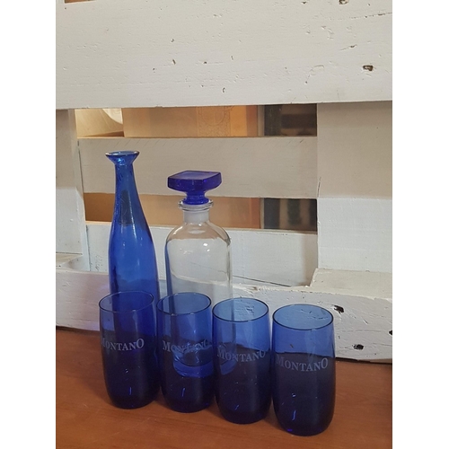 774J - Assorted Glassware; 4x Different Decanters, 4x Cobalt Blue Water Glasses, 6x Modern Wine Glasses, 1x... 