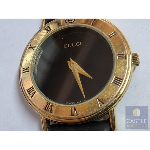 855P - GUCCI '3000.2.L' Gold Tone Wrist Watch, with Black Face and Gold Tone Hands, Swiss Made, * Running W... 