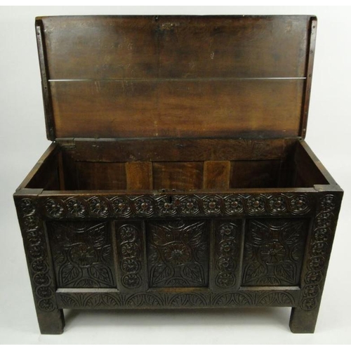 17 - Large antique oak coffer with floral carved front