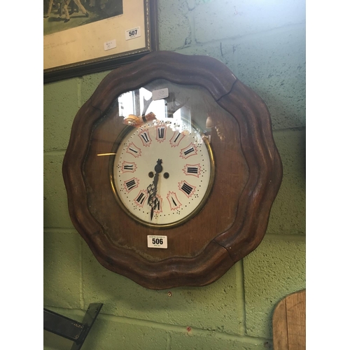 506 - Victorian wall clock with ceramic dial.