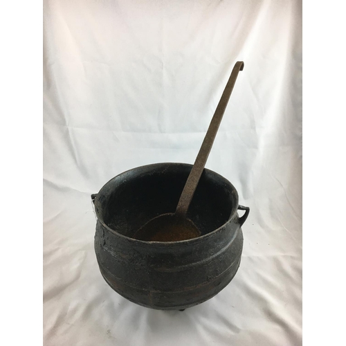 64 - Early 20th. C.  Metal pot and ladle.