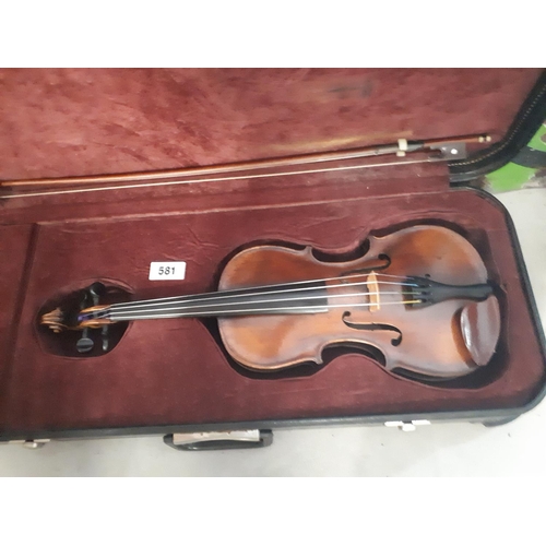 581 - German fiddle in case.