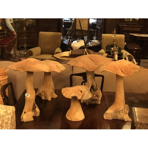 Set of 5 decorative hand carved wooden mushrooms. { tallest 58cm