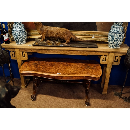 133 - Carved Chinese hard wood side table {79 cm H x 193 cm W x 30 cm D}.