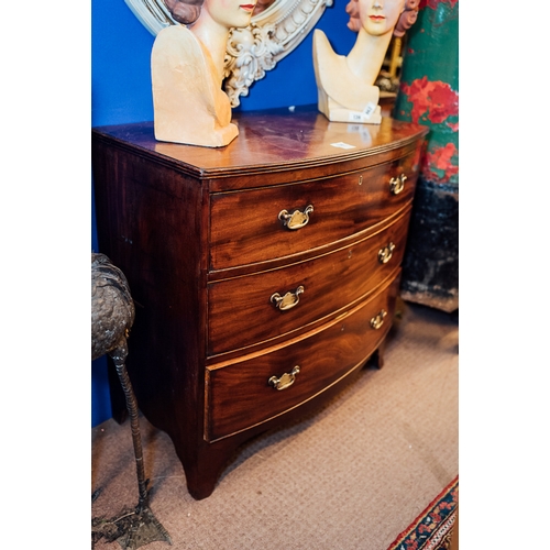 138 - Georgian mahogany bow fronted three draw chest of draws with original brass handles {90 cm H x 92 cm... 