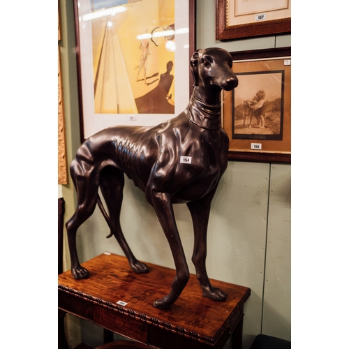 154 - Exceptional quality bronze life size Irish whippet {107 cm H x 100 cm W x 36 cm D}.