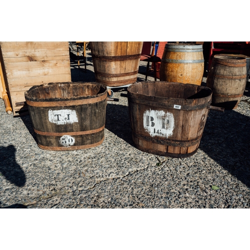 657 - Pair of early 19th C. oak and metal bound log buckets.