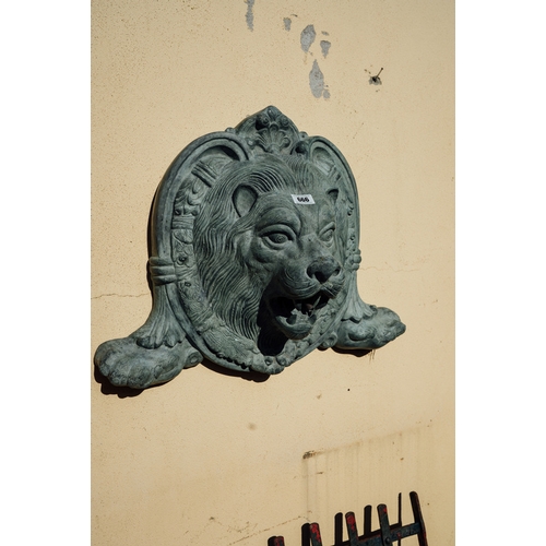 666 - Decorative bronze wall fountain in the form of a lions mask.