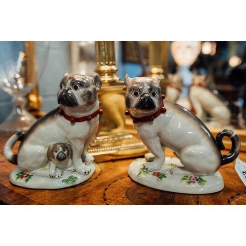 92 - Pair of decorative ceramic models of Pug dogs.