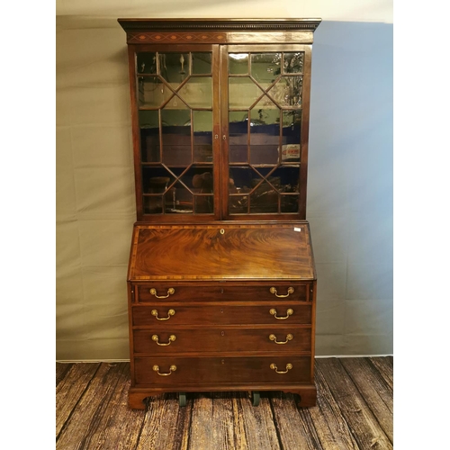 63 - Georgian mahogany bureau bookcase, the two astragal glazed doors above a fall front enclosing a fitt... 