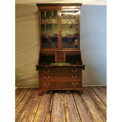 63 - Georgian mahogany bureau bookcase, the two astragal glazed doors above a fall front enclosing a fitt... 