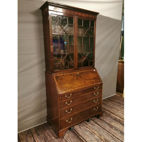 63 - Georgian mahogany bureau bookcase, the two astragal glazed doors above a fall front enclosing a fitt... 