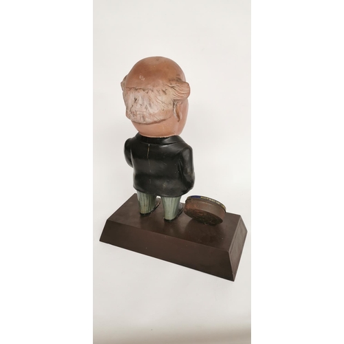 125 - Mick McQuaid rubberoid advertising figure. { 42cm H X 32cm W }.