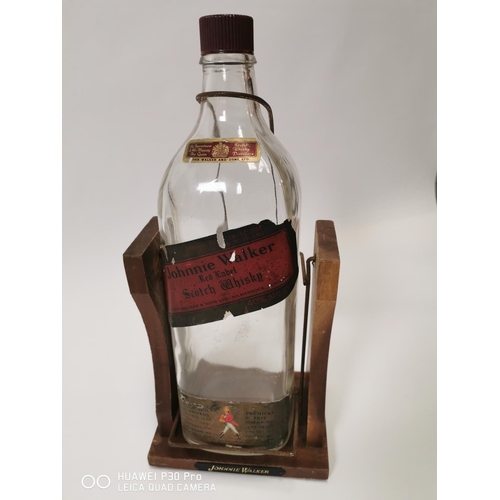 167 - 1970's Johnnie Walker Scotch Whiskey bottle on stand. { 46cm H X 20cm W X 14cm D }.