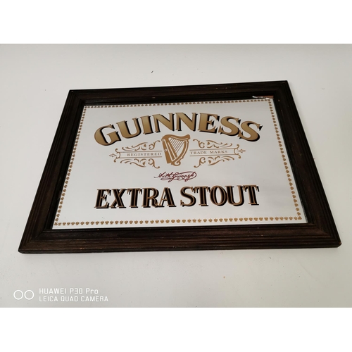 177 - Guinness Extra Stout advertising mirror. { 48cm H X 64cm W }.